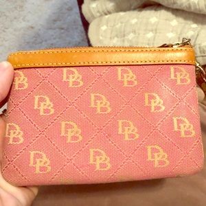 Dooney and Bourke coral wristlet